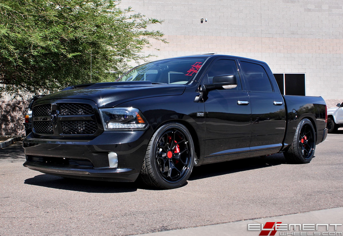 24 inch Staggered Rotiform HUR 3-Piece Matte Black Face/Gloss Black Lip on a 2011 Dodge Ram 1500 w/ specs