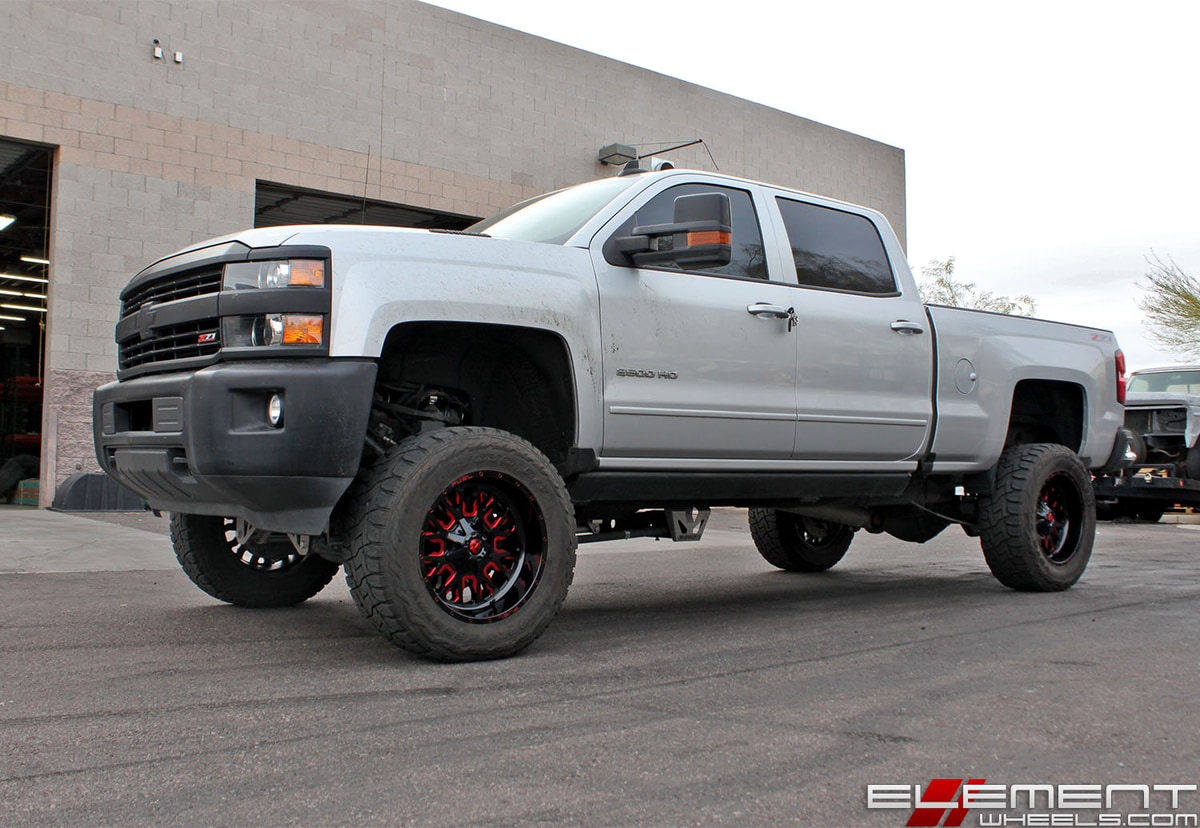 20x10 Fuel Off-Road Stroke Gloss Black w/ Candy Red on a 2016 Chevy Silverado 2500 w/ Specs