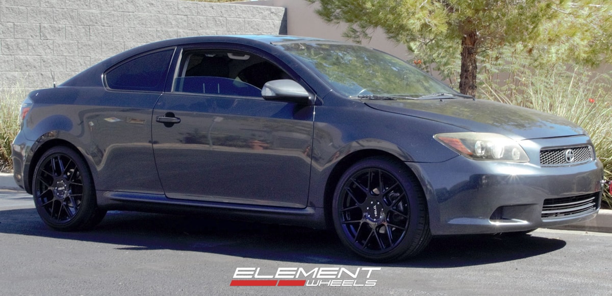 18 Inch Helo He912 Gloss Black on a 2008 Scion TC