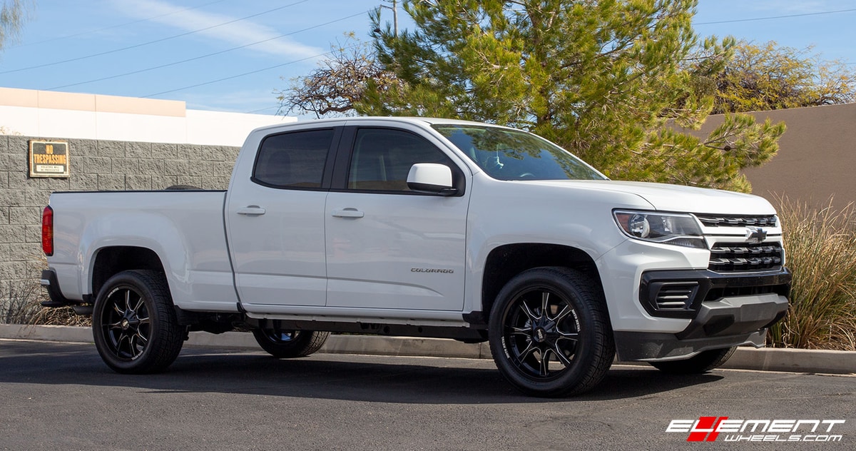 20 inch Moto Metal MO970 Gloss Black Milled Spoke on a 2020 Chevrolet Colorado