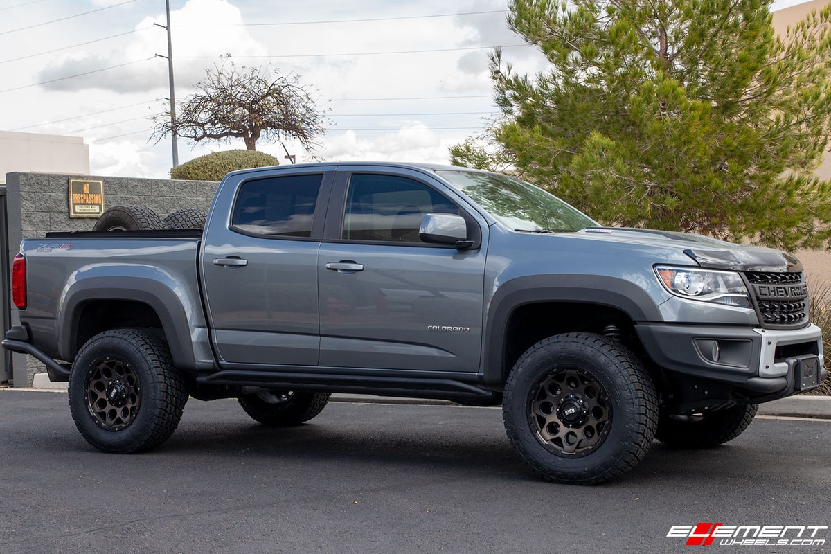 18 inch GRID Off-Road GD8 Matte Black w/ Bronze Dark Tint on a Leveled 2019 Chevrolet Colorado