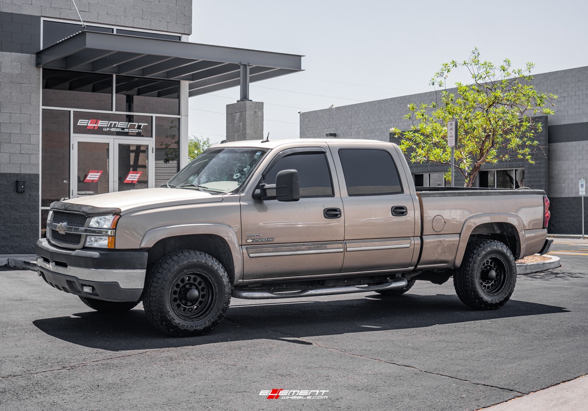 17 inch Raceline 887B Rockcrusher Matte Black on a 2004 Chevrolet Silverado 2500