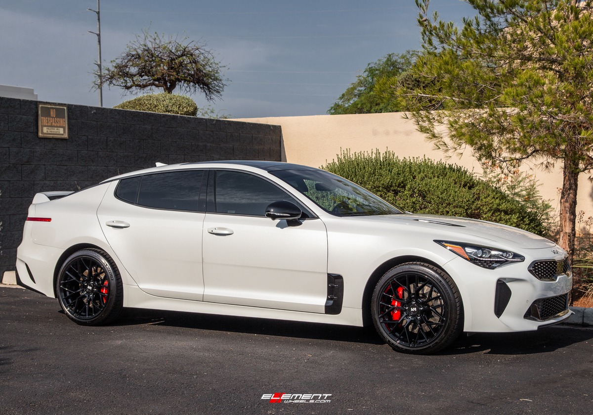 19 inch Staggered Variant Radon Gloss Piano Black on a 2022 Kia Stinger GT