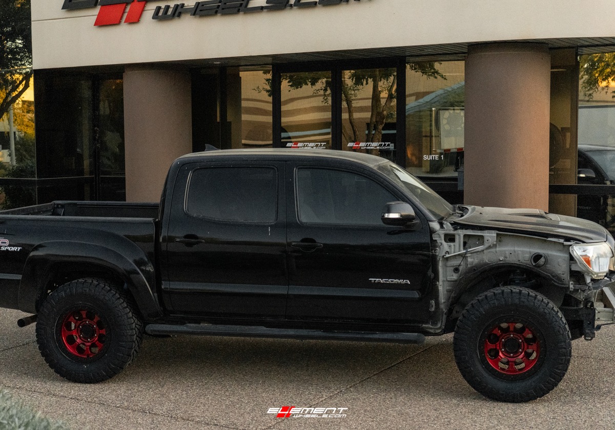 17 inch Black Rhino Riot Beadlock Candy Red w/ Black Ring & Bolts on a Leveled 2013 Toyota Tacoma