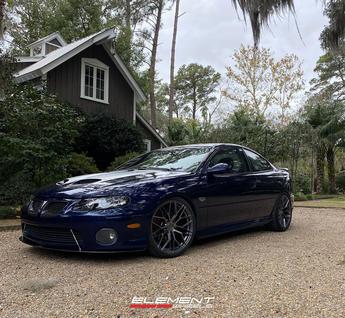 19 inch Staggered Avant Garde M520R Dark Graphite Metallic on a 2005 Pontiac GTO
