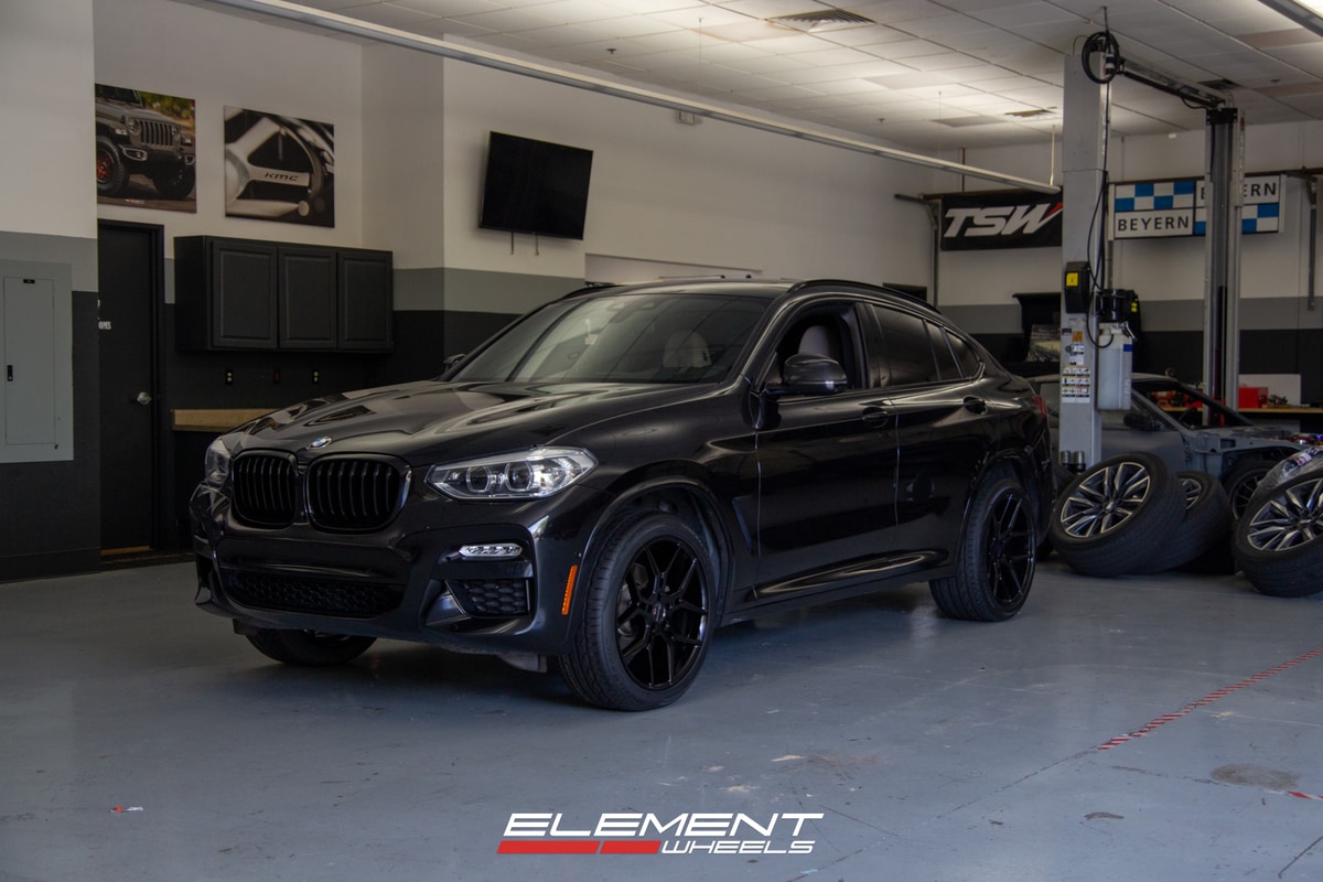 Staggered 20 Inch Giovanna Caleb in Gloss Black on a 2019 BMW X4