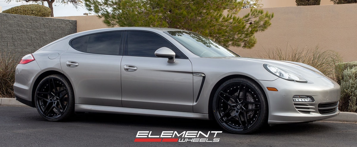 22 inch Staggered Lexani Spike Gloss Black on a 2012 Porsche Panamera 4