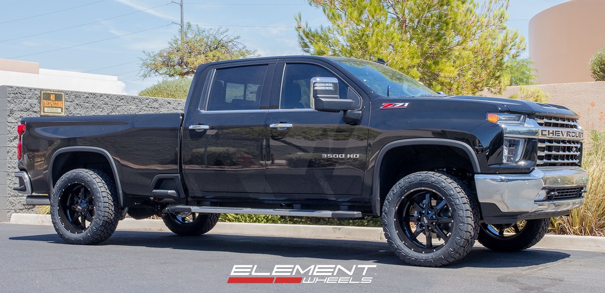 22 inch Moto Metal MO970 Gloss Black Milled Lip on a 2020 Chevrolet Silverado LTZ 3500