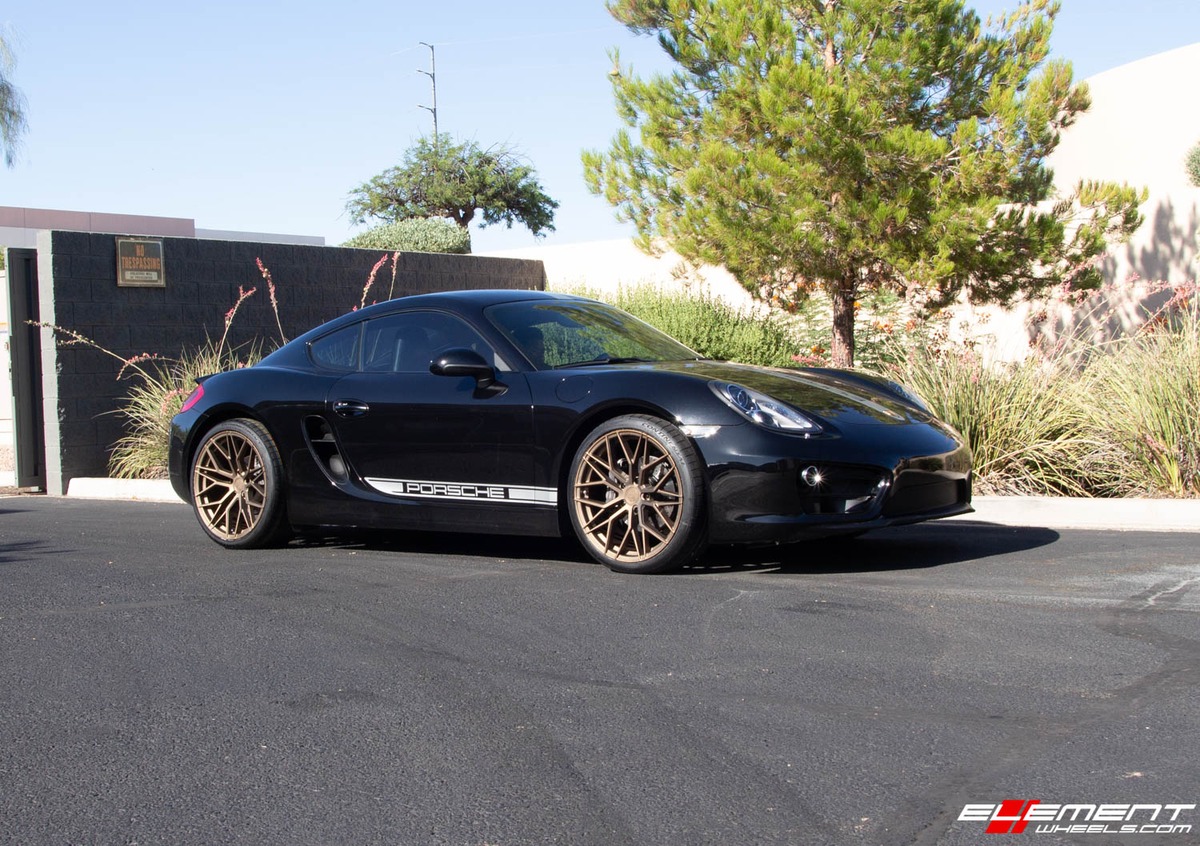 Staggered 20 Inch Avant Garde M520r in Matte Bronze on a 2014 Porsche Cayman