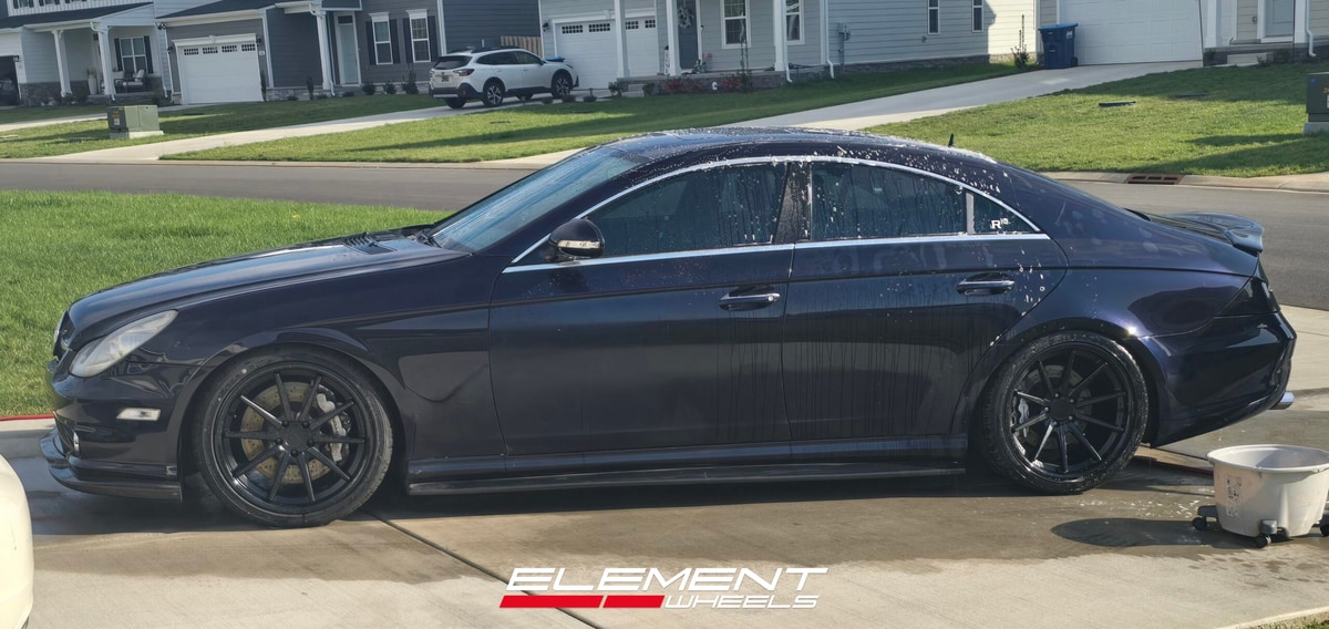 Staggered 19 inch Ferrada FR4 in Matte Black on an 2006 Mercedes CLS55 AMG
