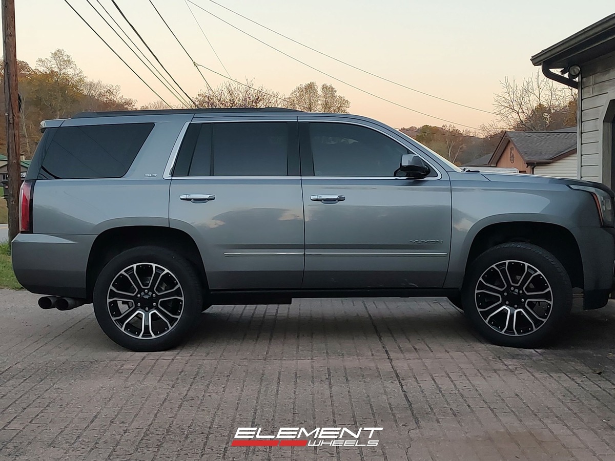22 Inch Factory Reproductions FR49 in Gloss Black Machined Face on a 2018 GMC Yukon