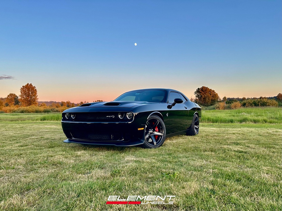 20 inch Staggered Factory Reproduction FR77 in Gloss Black on a 2020 Dodge Challenger