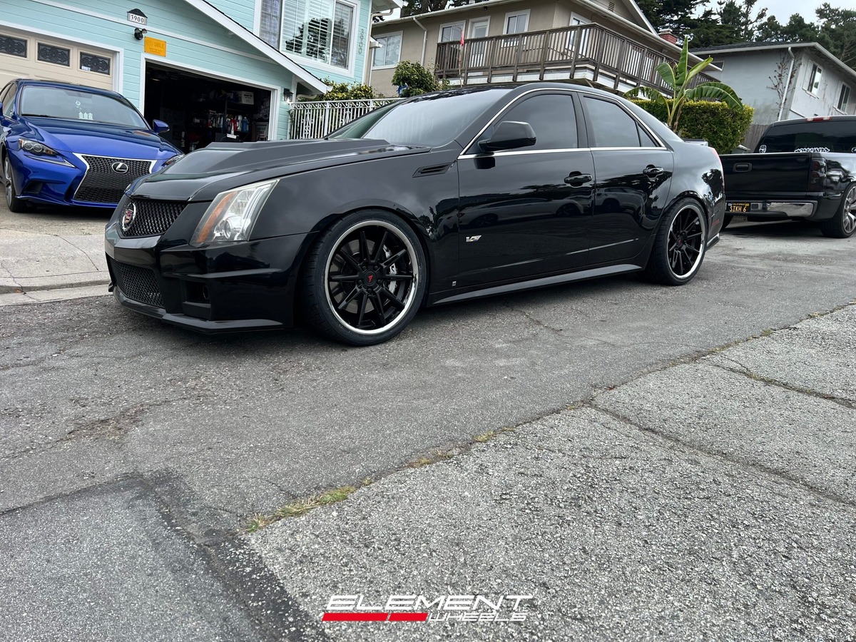Staggered 20 inch Ferrada CM2 in Matte Black on a 2009 Cadillac CTS-V