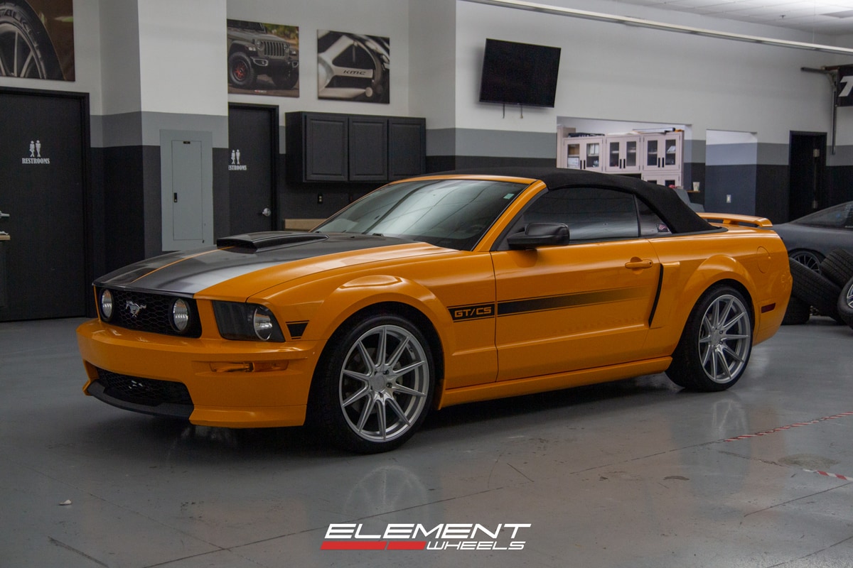 Staggered 20 Inch F1R F101 in Machine Silver on a 2007 Ford Mustang GT