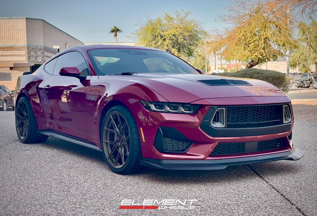 Staggered 20 inch Variant Nysa in Gloss Bronze on a 2024 Ford Mustang GT