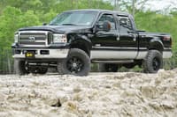 superlift 05-07 ford f-250/f-350 sd 4wd 4in lift kit w/repl radius arms & king coilovers rear shocks k975kg