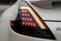 morimoto xb led tails: nissan 370z (09-20) (pair / smoked) lf419