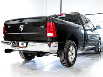 awe tuning 09-18 ram 1500 5.7l (w/o cutout) 0fg dual rear exit cat-back exhaust - diamond black tips 3015-33104 - image