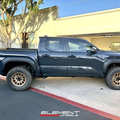 17 inch Method MR703 in Bronze on a 2024 Toyota Tacoma