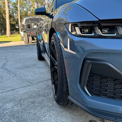 Staggered 20 inch Variant Nysa in Gloss Black on a 2024 Ford Mustang GT