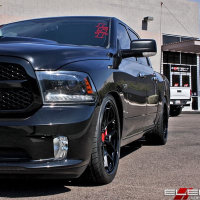 24 inch Staggered Rotiform HUR 3-Piece Matte Black Face/Gloss Black Lip on a 2011 Dodge Ram 1500 w/ specs