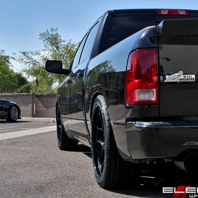 24 inch Staggered Rotiform HUR 3-Piece Matte Black Face/Gloss Black Lip on a 2011 Dodge Ram 1500 w/ specs