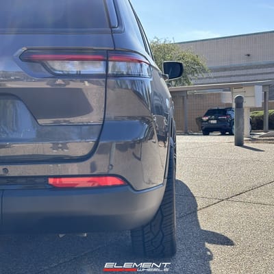 22 inch Curva Concepts C48 Gloss Black on a 2023 Jeep Grand Cherokee
