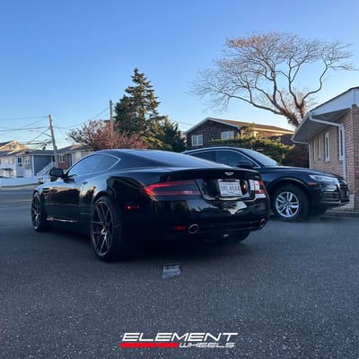 Staggered 20 inch Ace Alloy AFF02 in Gloss Mica Grey Machined on a 2005 Aston Martin DB9