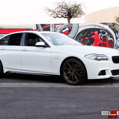 20 inch Staggered Vertini RF1.3 Light Brushed Bronze on a 13 BMW 550i Sedan w/ Specs