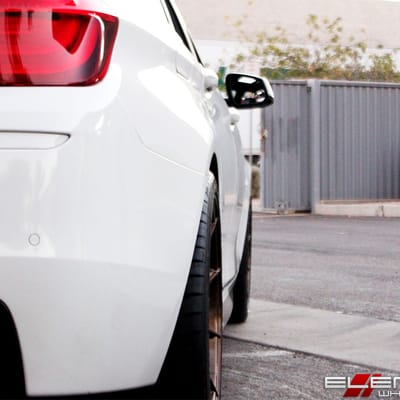 20 inch Staggered Vertini RF1.3 Light Brushed Bronze on a 13 BMW 550i Sedan w/ Specs
