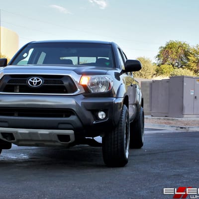 16x8 American Racing ATX AX202 Cast Iron Black on a 2013 Toyota Tacoma PreRunner w/ Specs