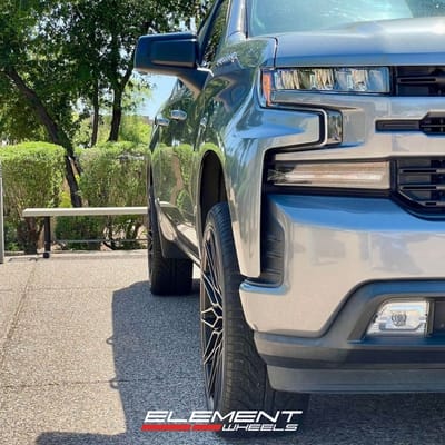 24 Inch Niche Calabria in Matte Black Machined Dark Tint on a 2019 Chevrolet Silverado 1500