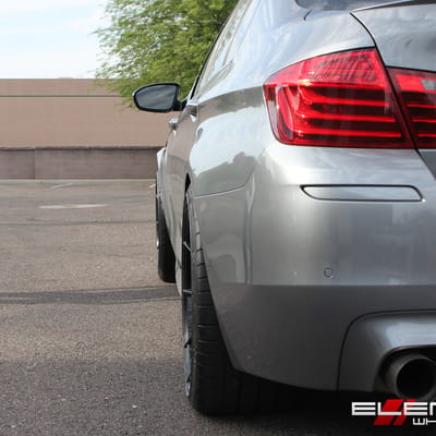20 in staggeredVertini RF1.2 Gloss Black (Rotary Forged) on a 2014 BMW M5 w/specs