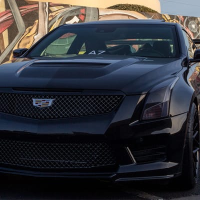 19 inch Staggered Variant Radon Gloss Piano Black on a 2016 Cadillac ATS-V