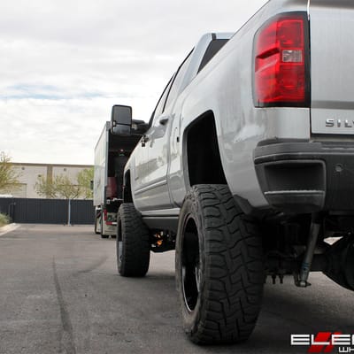 20x10 Fuel Off-Road Stroke Gloss Black w/ Candy Red on a 2016 Chevy Silverado 2500 w/ Specs