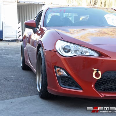 18x9.5 Drag SL5 Matte Black w/ Gloss Bronze Lip on a 2016 Scion FR-S w/ Specs