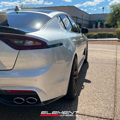 20 Inch Staggered Variant Helium Gloss Bronze on a 2018 Kia Stinger