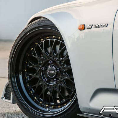 18x9.5 ARC ARO1 Gloss Black with Gold Rivets on Honda S2000 AP2