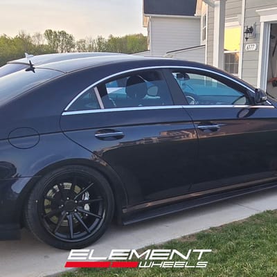 Staggered 19 inch Ferrada FR4 in Matte Black on an 2006 Mercedes CLS55 AMG