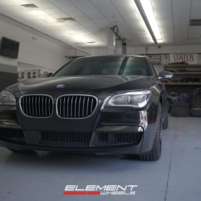 Staggered 20 Inch Variant Argon in Gloss Black on a 2014 BMW 750Li