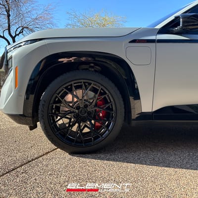 Staggered 22 Variant TWT Gloss Black on a 2024 BMW XM