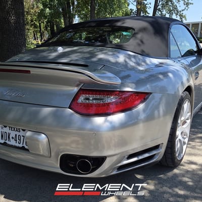 Staggered 19 inch Ruger Mesh in Liquid Silver on a 2010 Porsche 911 Carrera 997 Turbo