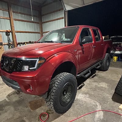 18 inch Black Rhino Barracade in OD Green w/ Black Rock Guard on a 2015 Nissan Frontier