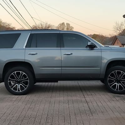 22 Inch Factory Reproductions FR49 in Gloss Black Machined Face on a 2018 GMC Yukon