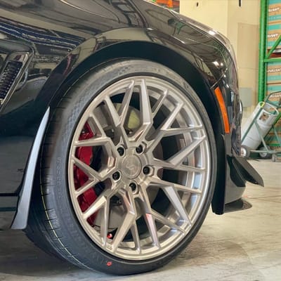 Staggered 19 inch Variant Radon's in Titanium Brushed Face on a 2023 Cadillac CT4-V Blackwing