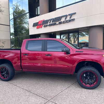 22 inch Fuel Off-Road Catalyst Matte Black w/ Candy Red Lip on a 2024 Chevrolet Silverado 1500