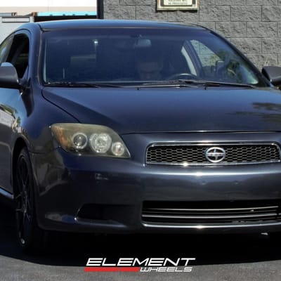 18 Inch Helo He912 Gloss Black on a 2008 Scion TC