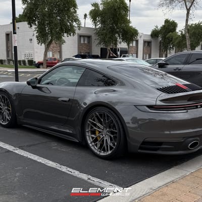 Staggered Set 20/21 inch Variant Maxim in Raw Titanium on a 2020 Porsche 911 Carrera 992
