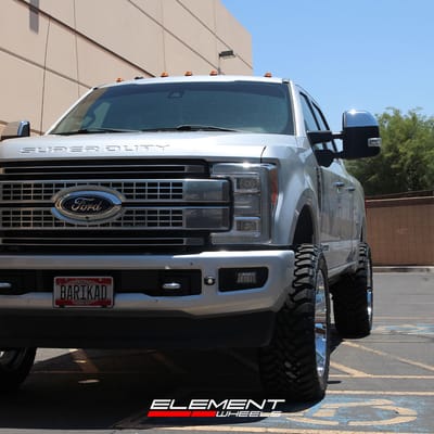 22 inch Fuel Off-Road Contra Chrome D614 on a Leveled 2018 Ford F-350HD