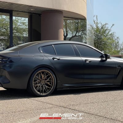 21 Inch Staggered Rohana RFX17 Gloss Bronze on a 2023 BMW M8 Competition
